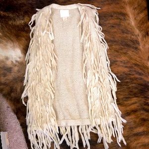 A VIBE! Super cool and unique sweater vest